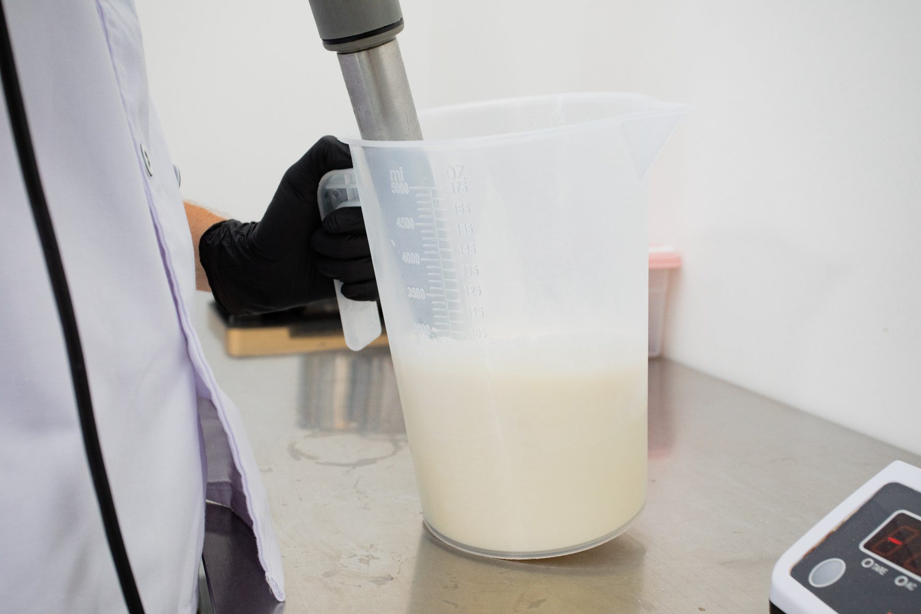Blending the milk base by hand in the Nami laboratory