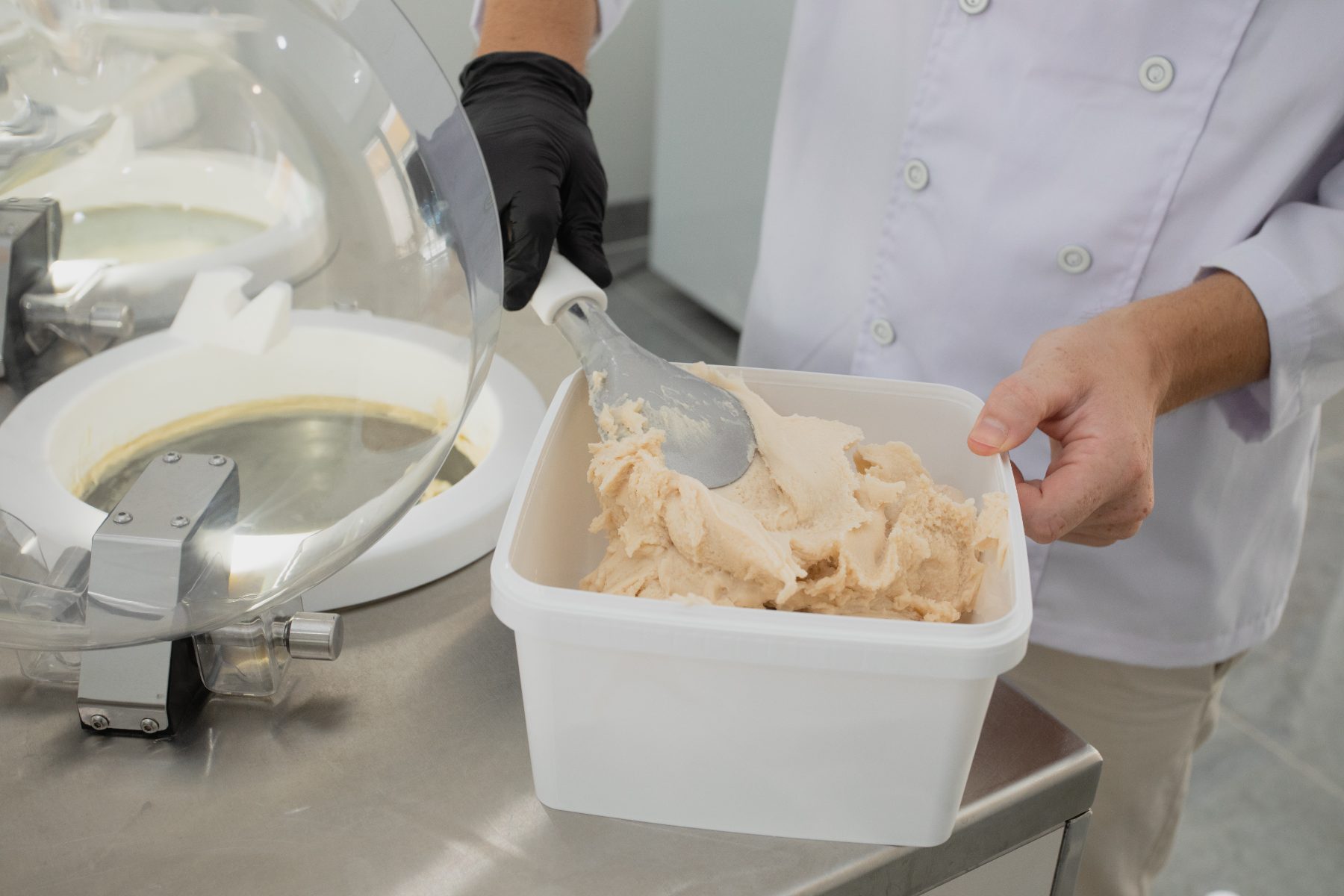 Fresh gelato served from the machine into a container
